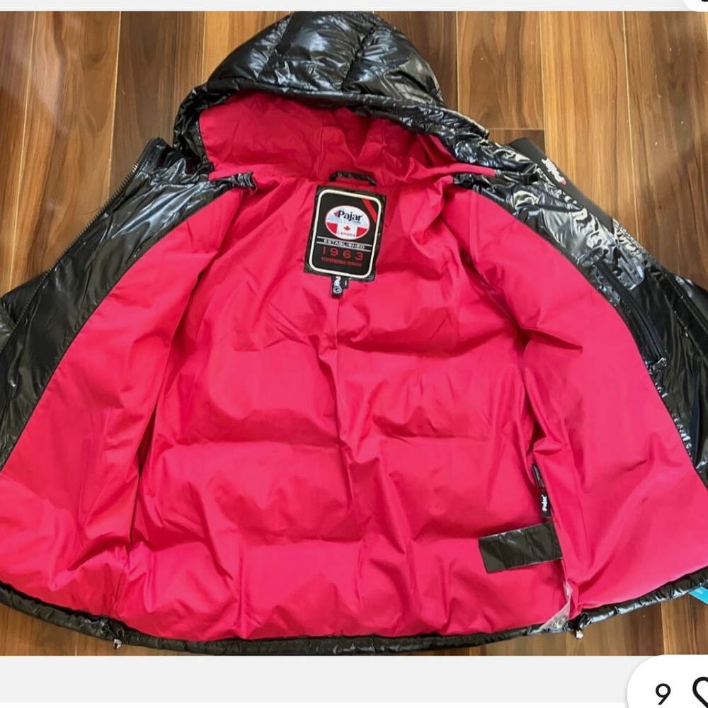 A black puffer Pajar coat. EXCELLENT QUALITY, didn’t wear a lot! Must buy!!!